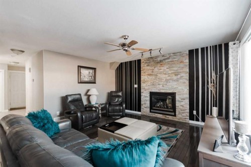172 Berard Crescent, Fort Mcmurray, AB - Indoor Photo Showing Living Room With Fireplace