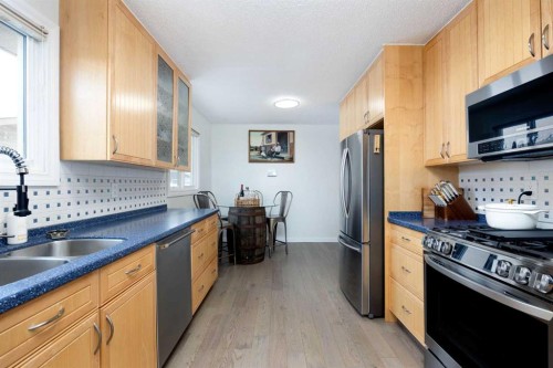 100 Simcoe Way, Fort Mcmurray, AB - Indoor Photo Showing Kitchen With Stainless Steel Kitchen With Double Sink