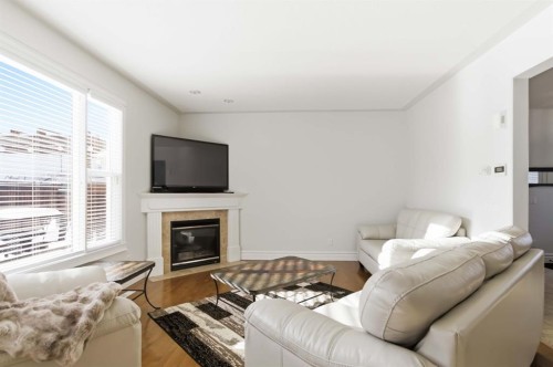 157 Mayflower Crescent, Fort Mcmurray, AB - Indoor Photo Showing Living Room With Fireplace
