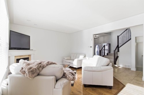157 Mayflower Crescent, Fort Mcmurray, AB - Indoor Photo Showing Living Room With Fireplace