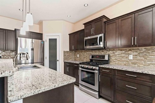 224 Coniker Crescent, Fort Mcmurray, AB - Indoor Photo Showing Kitchen With Double Sink With Upgraded Kitchen