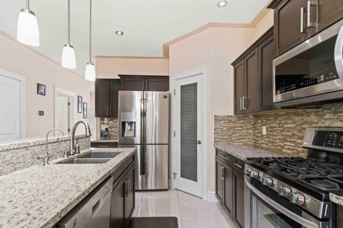 224 Coniker Crescent, Fort Mcmurray, AB - Indoor Photo Showing Kitchen With Double Sink With Upgraded Kitchen