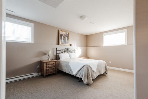 100 Honeysuckle Way, Fort Mcmurray, AB - Indoor Photo Showing Bedroom