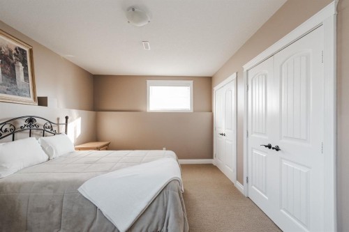 100 Honeysuckle Way, Fort Mcmurray, AB - Indoor Photo Showing Bedroom