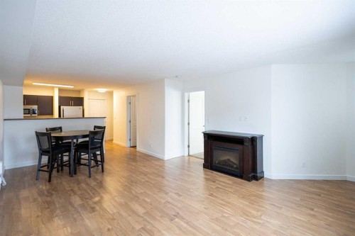 208-234 Stony Mountain Road, Anzac, AB - Indoor With Fireplace