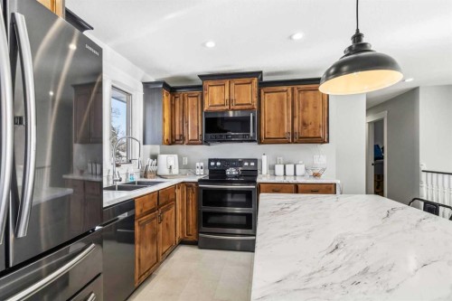 17 Clark Crescent, Fort Mcmurray, AB - Indoor Photo Showing Kitchen With Double Sink