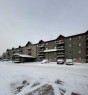 1410-200 Lougheed Drive, Fort Mcmurray, AB  - Outdoor With Balcony With Facade 