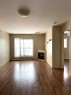 1410-200 Lougheed Drive, Fort Mcmurray, AB  - Indoor Photo Showing Living Room With Fireplace 