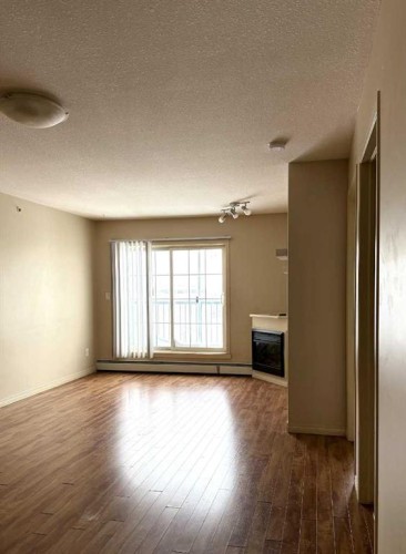 1410-200 Lougheed Drive, Fort Mcmurray, AB - Indoor With Fireplace