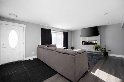 157 Beaumont Crescent, Fort Mcmurray, AB - Indoor Photo Showing Living Room With Fireplace