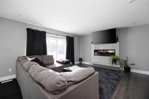 157 Beaumont Crescent, Fort Mcmurray, AB - Indoor Photo Showing Living Room With Fireplace