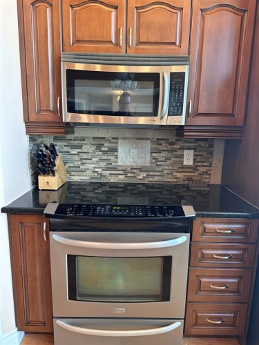 134, 15474 Old Trail, Lac La Biche, AB - Indoor Photo Showing Kitchen