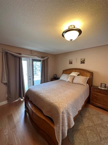 134, 15474 Old Trail, Lac La Biche, AB - Indoor Photo Showing Bedroom