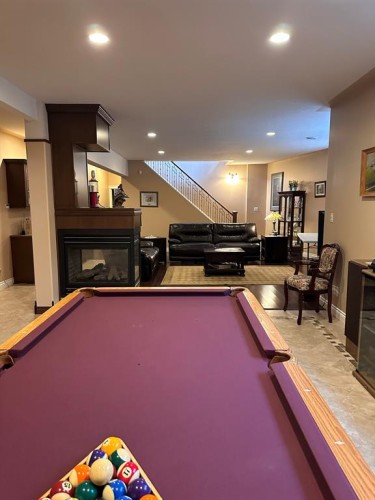 134, 15474 Old Trail, Lac La Biche, AB - Indoor Photo Showing Other Room With Fireplace
