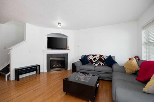 209 Grouse Way, Fort Mcmurray, AB - Indoor Photo Showing Living Room With Fireplace
