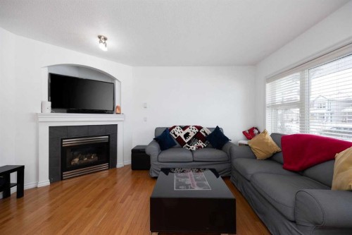 209 Grouse Way, Fort Mcmurray, AB - Indoor Photo Showing Living Room With Fireplace