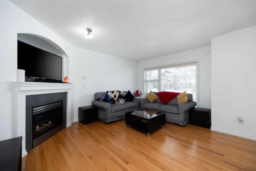 209 Grouse Way, Fort Mcmurray, AB - Indoor Photo Showing Living Room With Fireplace