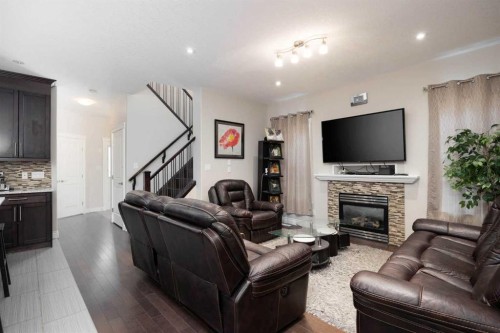 157 Coniker Crescent, Fort Mcmurray, AB - Indoor Photo Showing Living Room With Fireplace