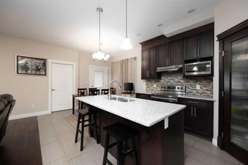 157 Coniker Crescent, Fort Mcmurray, AB - Indoor Photo Showing Kitchen With Double Sink With Upgraded Kitchen