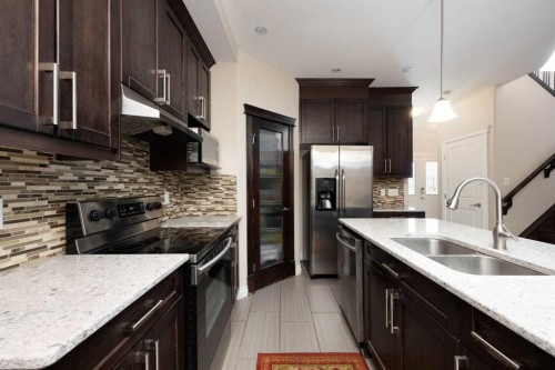 157 Coniker Crescent, Fort Mcmurray, AB - Indoor Photo Showing Kitchen With Double Sink With Upgraded Kitchen