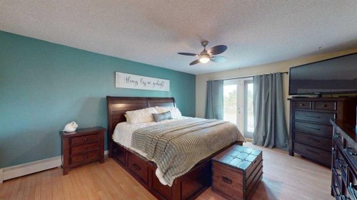 185 Oaks Bay, Fort Mcmurray, AB - Indoor Photo Showing Bedroom