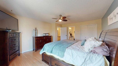 185 Oaks Bay, Fort Mcmurray, AB - Indoor Photo Showing Bedroom