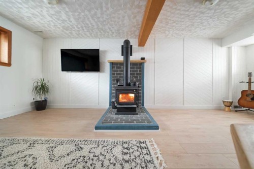 195 Cornwall Drive, Fort Mcmurray, AB - Indoor Photo Showing Other Room With Fireplace