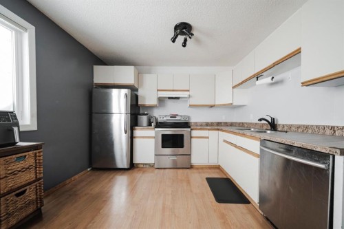 181 Windsor Drive, Fort Mcmurray, AB - Indoor Photo Showing Kitchen With Stainless Steel Kitchen With Double Sink