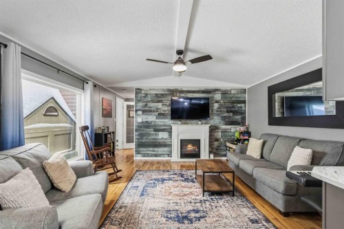189 Cree Road, Fort Mcmurray, AB - Indoor Photo Showing Living Room With Fireplace