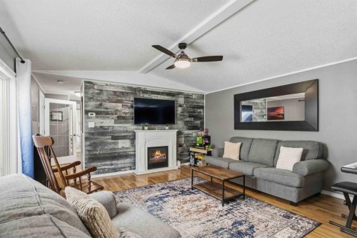 189 Cree Road, Fort Mcmurray, AB - Indoor Photo Showing Living Room With Fireplace