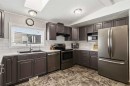 189 Cree Road, Fort Mcmurray, AB  - Indoor Photo Showing Kitchen With Stainless Steel Kitchen With Double Sink With Upgraded Kitchen 