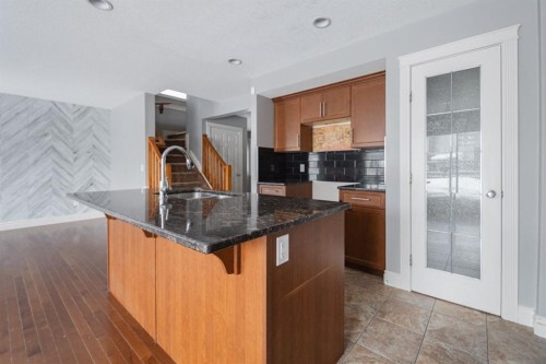 205 Diamondstone Ridge, Fort Mcmurray, AB - Indoor Photo Showing Kitchen With Double Sink