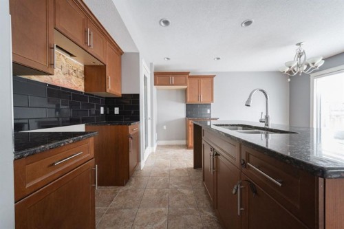 205 Diamondstone Ridge, Fort Mcmurray, AB - Indoor Photo Showing Kitchen With Double Sink