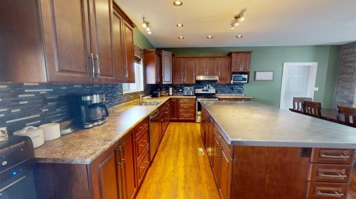 101 68134, Plamondon, AB - Indoor Photo Showing Kitchen With Double Sink