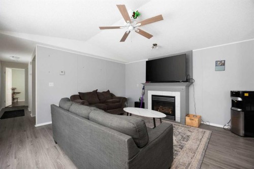 488 Harpe Way, Fort Mcmurray, AB - Indoor Photo Showing Living Room With Fireplace