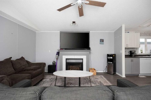 488 Harpe Way, Fort Mcmurray, AB - Indoor Photo Showing Living Room With Fireplace