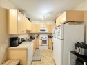 1208-200 Lougheed Drive, Fort Mcmurray, AB  - Indoor Photo Showing Kitchen With Double Sink 
