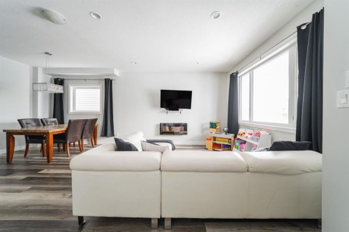 224 Warren Way, Fort Mcmurray, AB - Indoor Photo Showing Living Room With Fireplace