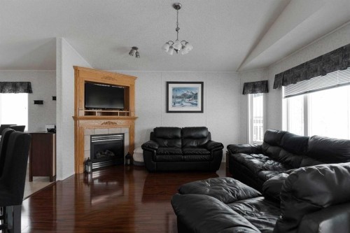 157 Ash Way, Fort Mcmurray, AB - Indoor Photo Showing Living Room With Fireplace