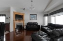 157 Ash Way, Fort Mcmurray, AB  - Indoor Photo Showing Living Room With Fireplace 