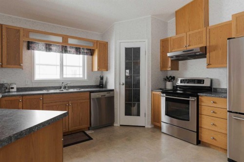 157 Ash Way, Fort Mcmurray, AB - Indoor Photo Showing Kitchen With Double Sink