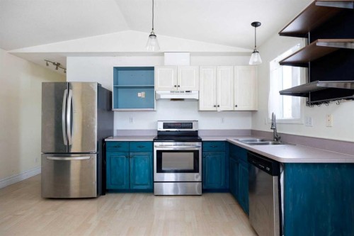 101 Black Bear Crescent, Fort Mcmurray, AB - Indoor Photo Showing Kitchen With Double Sink