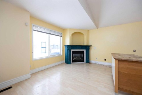 101 Black Bear Crescent, Fort Mcmurray, AB - Indoor Photo Showing Living Room With Fireplace