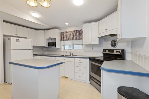 210 Grant Way, Fort Mcmurray, AB - Indoor Photo Showing Kitchen With Double Sink