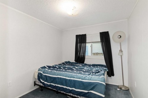 210 Grant Way, Fort Mcmurray, AB - Indoor Photo Showing Bedroom