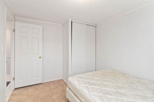 210 Grant Way, Fort Mcmurray, AB - Indoor Photo Showing Bedroom