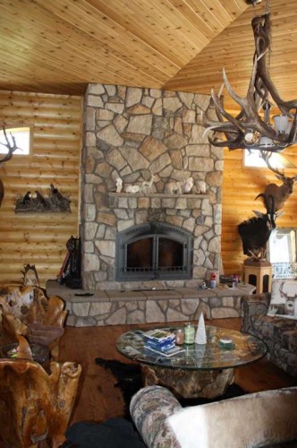 67305 144A Range Road, Lac La Biche, AB - Indoor Photo Showing Living Room With Fireplace