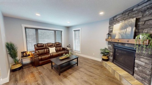 101 Ryan Lane, Fort Mcmurray, AB - Indoor Photo Showing Living Room With Fireplace