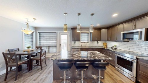 101 Ryan Lane, Fort Mcmurray, AB - Indoor Photo Showing Kitchen With Stainless Steel Kitchen With Upgraded Kitchen