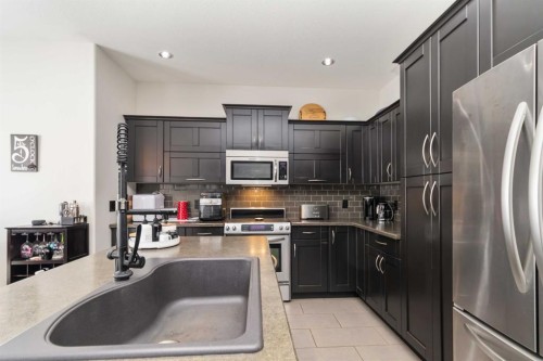 495 Killdeer Way, Fort Mcmurray, AB - Indoor Photo Showing Kitchen With Stainless Steel Kitchen With Double Sink With Upgraded Kitchen